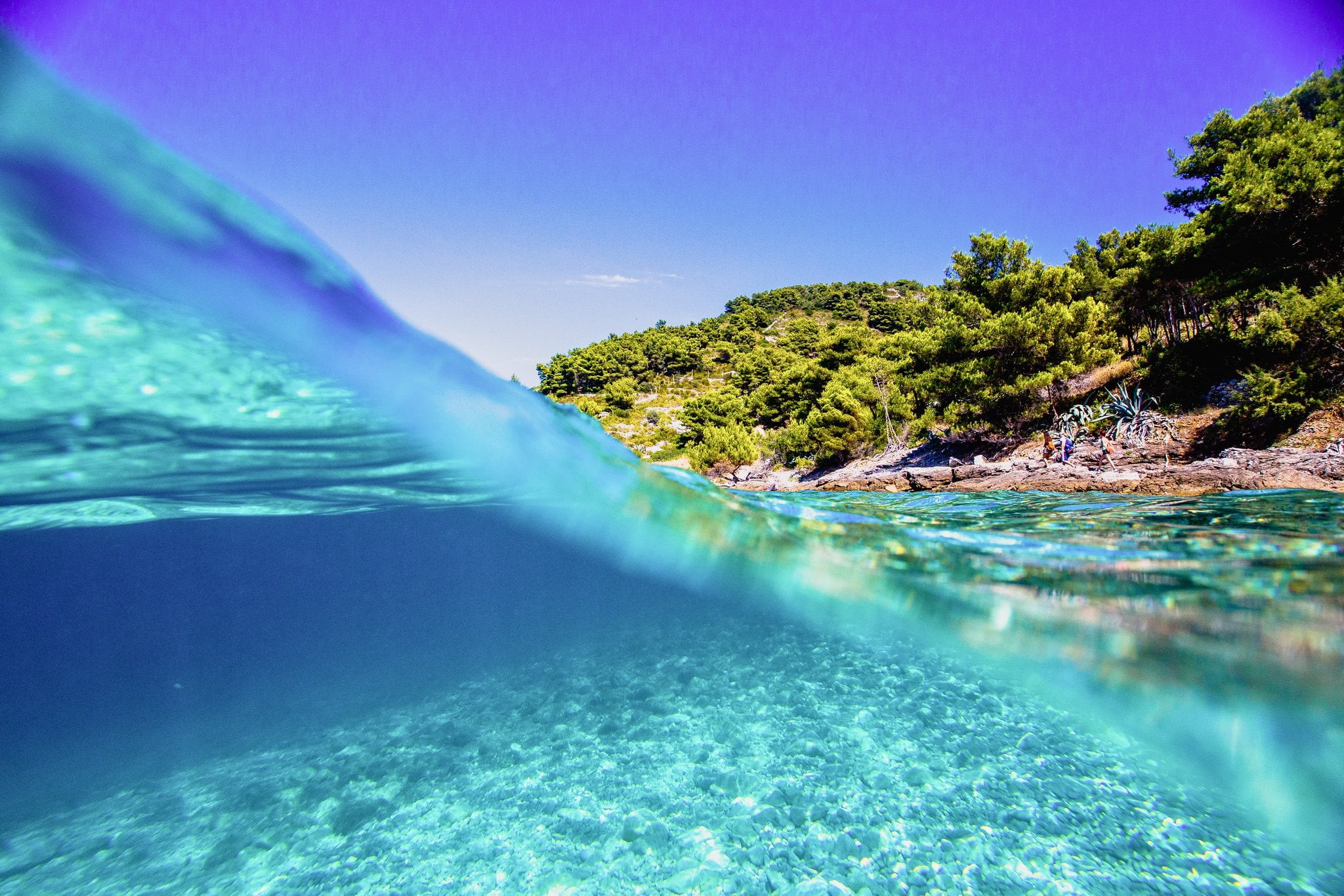 Aerial view of the Blue Lagoon and pristine islands near Split, showcasing turquoise waters and natural beauty