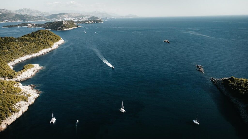 An image of the beautiful Croatian scenery, with the islands, sea and boats in the background.